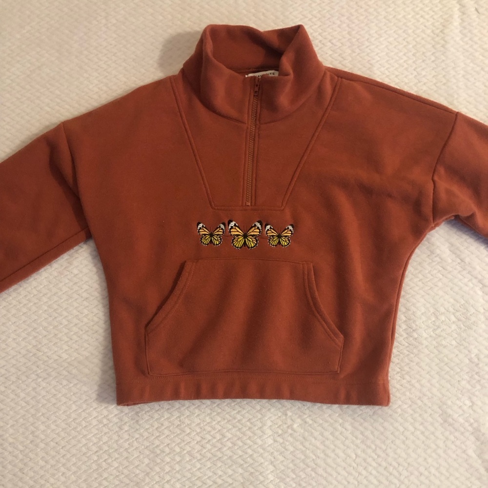Rue 21 size medium burnt orange quarter zip jacket.